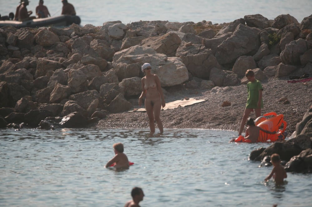 FKK cove pyramid in waters - People who practice nudism also believe that everyone is equal, regardless of circumstances