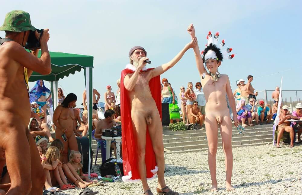 Native Headdress Dance pics - Nudism promotes respect for the environment