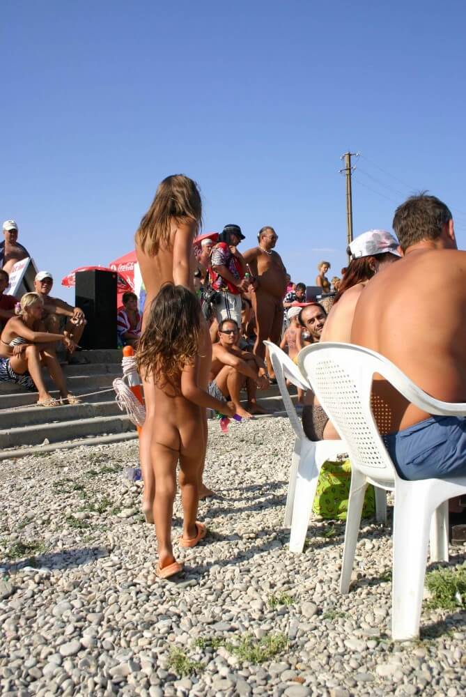 Naturist Standing Sideline - Public nudism
