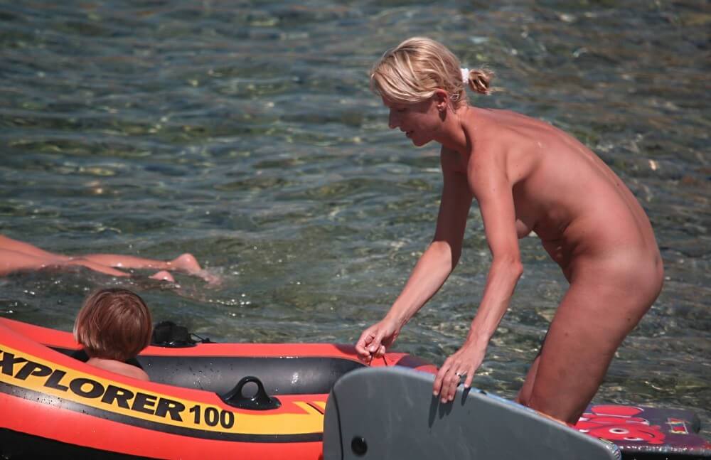 Red Boating for Two Nudists pics - Living in harmony and tranquility is the primary goal of naturists and nudists
