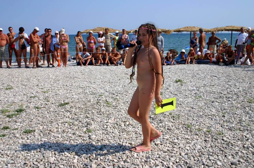 Naturist Mic Speech photos - Are required to remain naked at all times