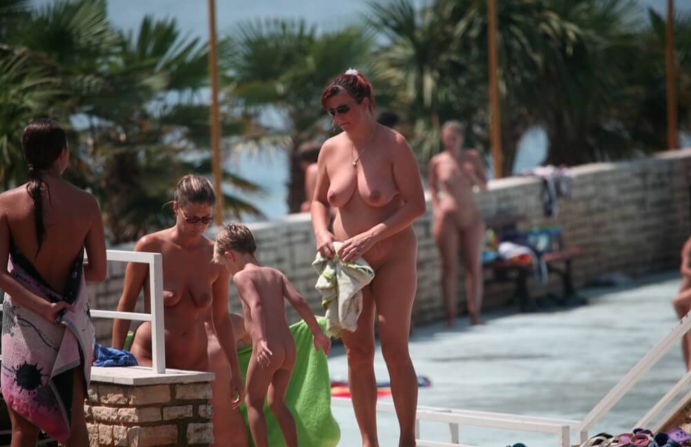 Boardwalk Biking pics - Nudism promotes happiness and well-being