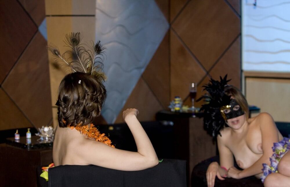 Masquerade Lounging photos - People practice nudism to achieve harmony with nature