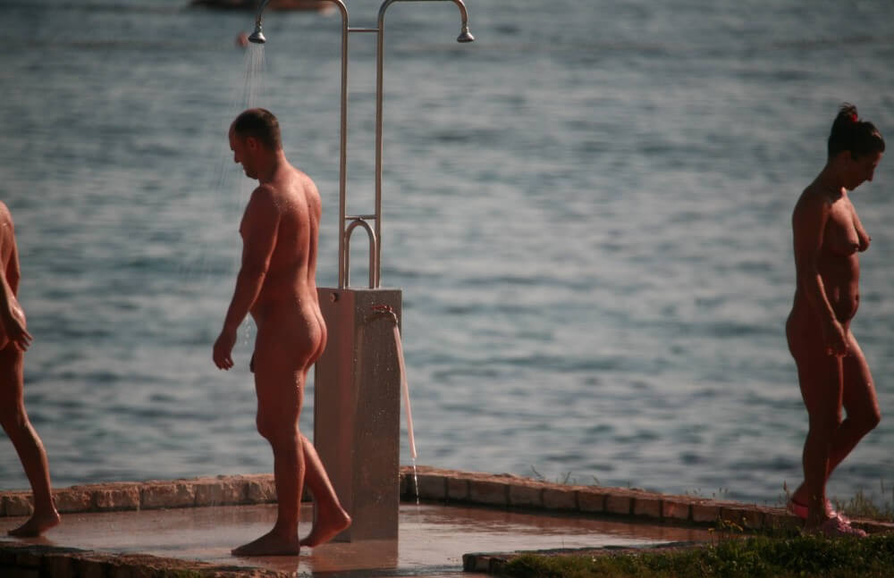 Naturist Shower at Dusk pics - Visiting the Beach Without Clothes