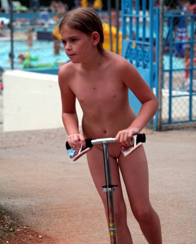 Pool-Side Naturist Scooter pics - A nudist values inner balance and peace of mind