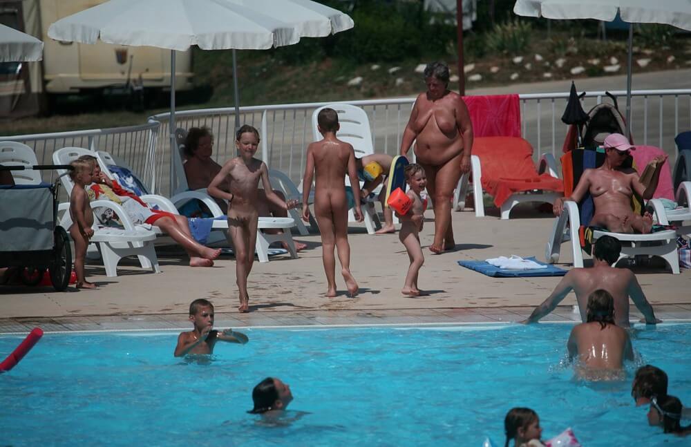 Naturist Afternoon Pool Games pics - Nudity helps us better understand ourselves and the world around us