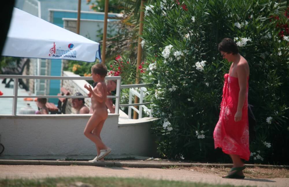 Naturist Pool Walkaround pics - Undressing is permissible only within ones own community