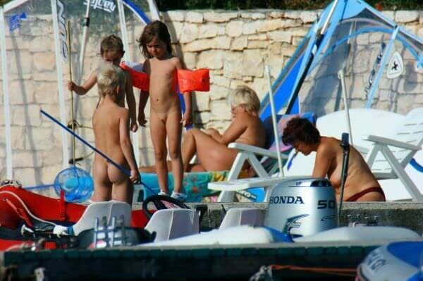 By the boat photos - Nudity fosters trust and mutual understanding among people