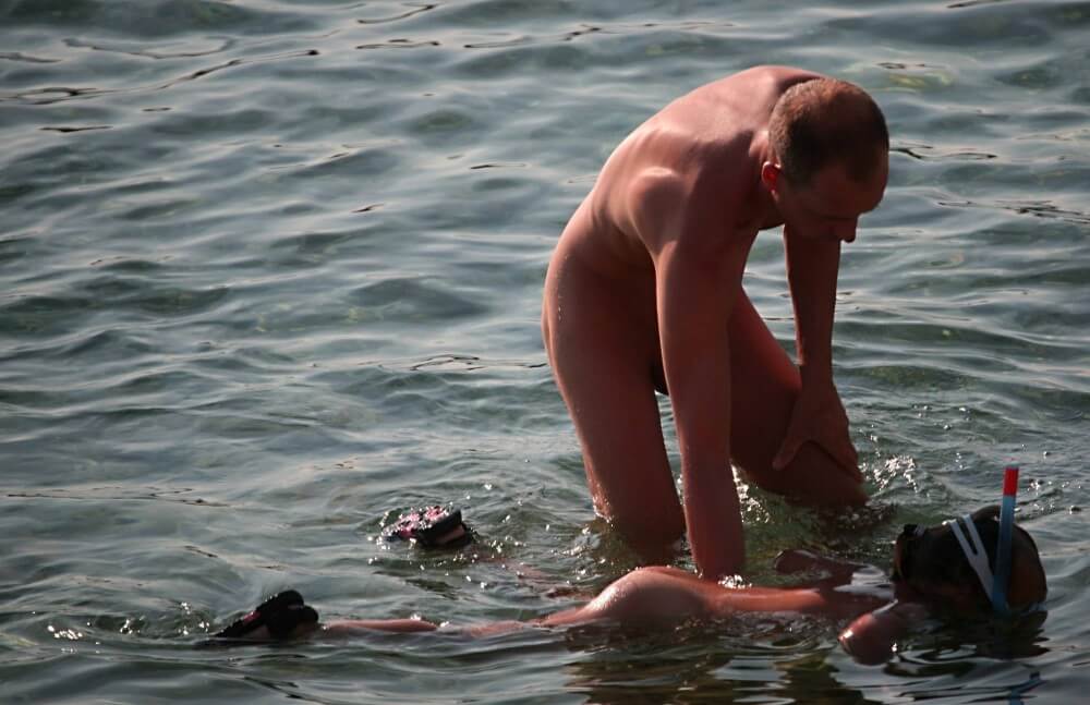 Father Floats His Daughter pics - The practice of naturism promotes inner harmony and peace
