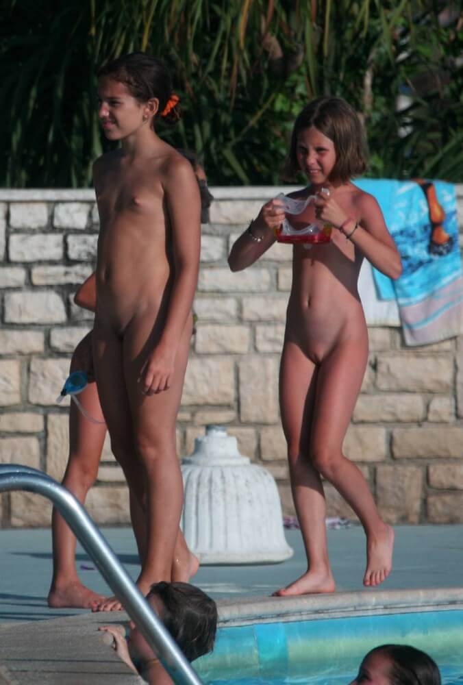 Two Poolside Nudist Girls pics - Nudity helps one appreciate the present moment